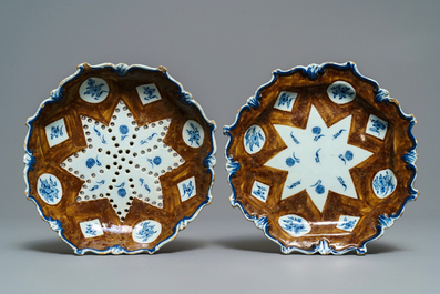 A Dutch Delft blue and white 'capucin brown ground' strainer on stand, 18th C.