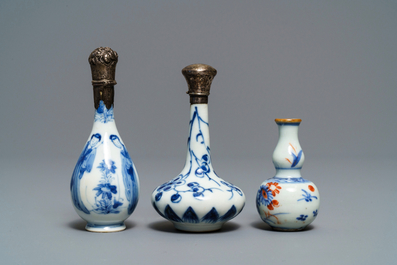 Nine Chinese blue and white miniature vases, an 'Amsterdams bont' teapot and a milk jug, Kangxi and later