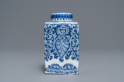 A Dutch Delft blue and white tea caddy with screw cap, late 17th C.