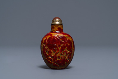 A Chinese carved realgar glass snuff bottle, Imperial Glassworks, Beijing, 1730-1840