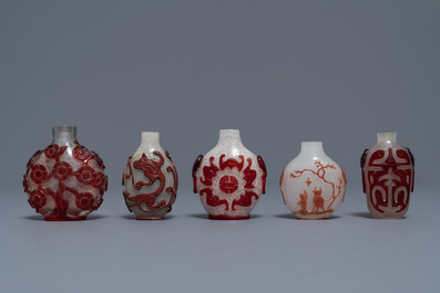 Ten Chinese red overlay, snowflake and transparent glass snuff bottles, 18/20th C.