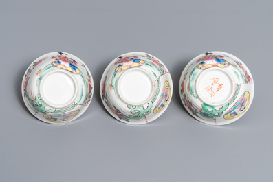 A Chinese famille rose teapot, six saucers and three cups, Yongzheng/Qianlong