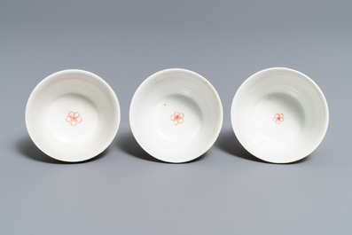 A Chinese famille rose teapot, six saucers and three cups, Yongzheng/Qianlong