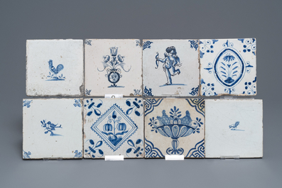 A collection of 54 Dutch Delft blue and white and manganese tiles, 17/18th C.