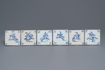 Fifteen Dutch Delft blue and white tiles with horseriders and animals, 17/18th C.