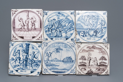 A collection of 54 biblical Dutch Delft blue and white and manganese tiles, 18th C.
