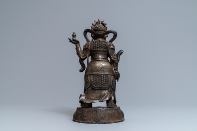 A Chinese gilt-lacquered bronze figure of Weituo, Ming