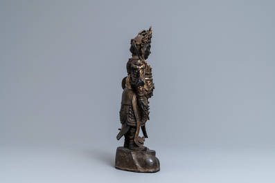 A Chinese gilt-lacquered bronze figure of Weituo, Ming