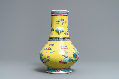 A Chinese yellow-ground famille rose bottle vase with antiquities design, Yongzheng