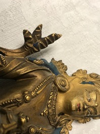 A Chinese gilt bronze figure of Amitayus, 17/18th C.