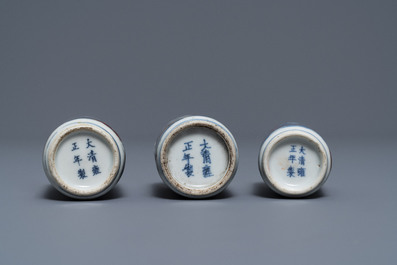 Three Chinese blue, white and underglaze red snuff bottles, Yongzheng marks, 18/19th C.