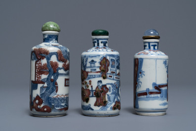 Three Chinese blue, white and underglaze red snuff bottles, Yongzheng marks, 18/19th C.