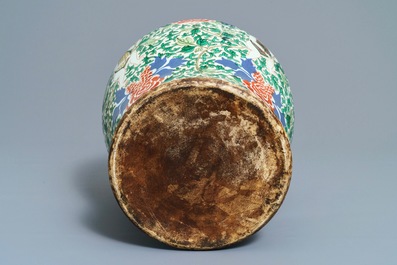 A Chinese wucai 'boys and peony scrolls' vase, 19th C.