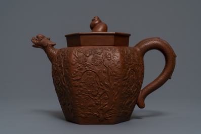 A large Chinese Yixing stoneware teapot with applied design, Kangxi