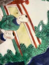 A Chinese wucai baluster vase and cover with playing boys, Transitional period