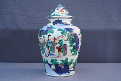 A Chinese wucai baluster vase and cover with playing boys, Transitional period