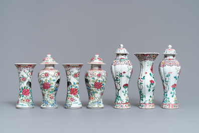 Two Chinese famille rose vase garnitures, Qianlong and 19th C.