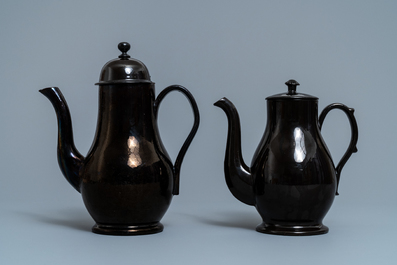 Four silver-mounted Namur black-glazed pottery coffeepots and a teapot, 18th C.