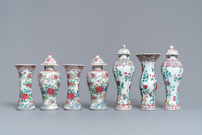 Two Chinese famille rose vase garnitures, Qianlong and 19th C.