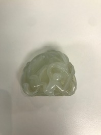 A Chinese celadon jade carving of two monkeys on a peach, 19th C.