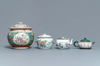 A collection of Chinese famille rose porcelain and a Yixing stoneware teapot, 18/19th C.