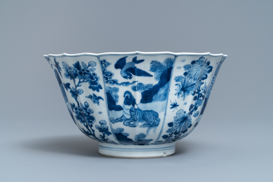 A Chinese blue and white bowl with mythical beasts and flowers, Kangxi