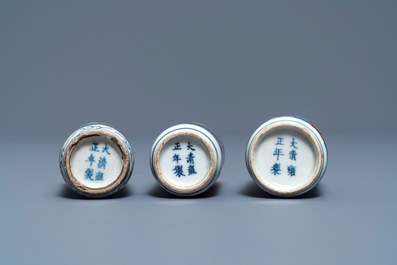 Three Chinese blue, white and underglaze red snuff bottles, Yongzheng marks, 19th C.