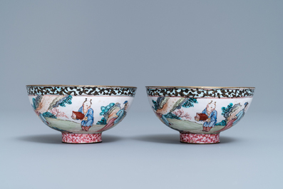 A pair of Chinese Canton enamel bowls with figures in a landscape, Yongzheng/Qianlong