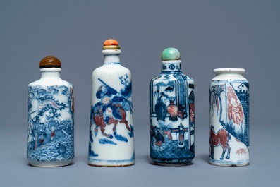 Four Chinese blue, white and underglaze red snuff bottles, 18/19th C.