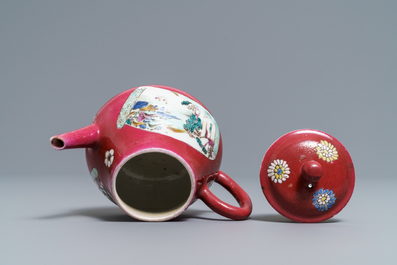 A Chinese famille rose ruby-ground teapot, three cups and two saucers, Yongzheng