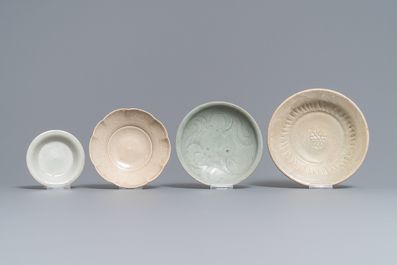 A collection of 15 Chinese celadon- and cream-glazed wares, Song and later