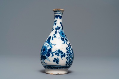 Three Dutch Delft blue and white vases and a chinoiserie jug, 17/18th C.