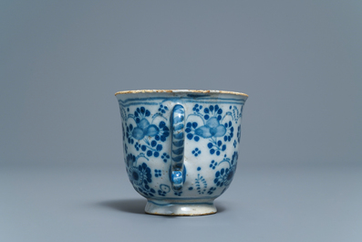 A Dutch Delft blue and white two-handled cup, 18th C.