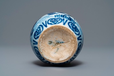 Three Dutch Delft blue and white vases and a chinoiserie jug, 17/18th C.