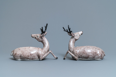 A pair of large Chinese aubergine-glazed models of recumbent deer, 18/19th C.