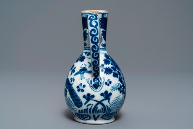 Three Dutch Delft blue and white vases and a chinoiserie jug, 17/18th C.