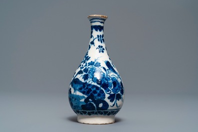 Three Dutch Delft blue and white vases and a chinoiserie jug, 17/18th C.