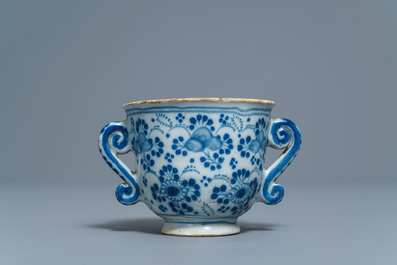 A Dutch Delft blue and white two-handled cup, 18th C.
