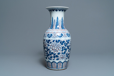 A Chinese blue, white and underglaze red vase, 19th C.