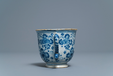 A Dutch Delft blue and white two-handled cup, 18th C.