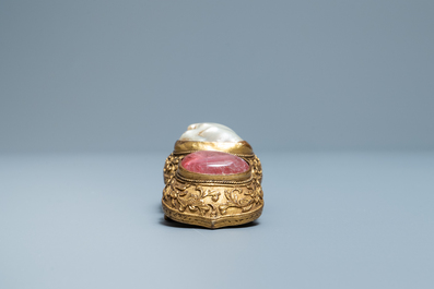 A Chinese baroque pearl and rose quartz inset gilt-bronze belt buckle, Ming
