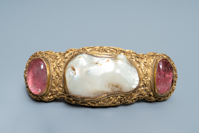 A Chinese baroque pearl and rose quartz inset gilt-bronze belt buckle, Ming