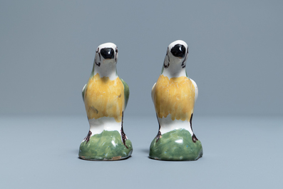 A pair of polychrome Dutch Delft miniature models of parrots, 18th C.