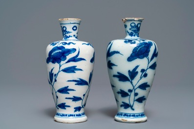 Three Dutch Delft blue and white vases and a chinoiserie jug, 17/18th C.