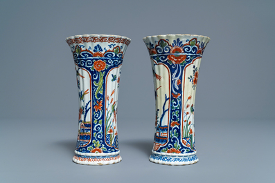 A pair of ribbed Dutch Delft cashmere palette beaker vases, early 18th C.