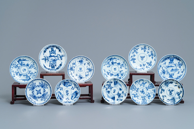 A collection of 22 Chinese blue and white cups and 32 saucers, Kangxi/Qianlong