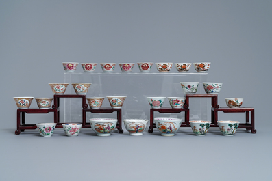 A collection of 26 Chinese famille rose cups and 28 saucers, Yongzheng/Qianlong