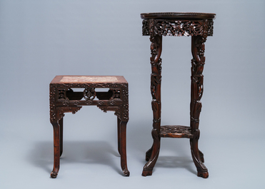 Two Chinese carved wooden stands with marble tops, 19/20th C.