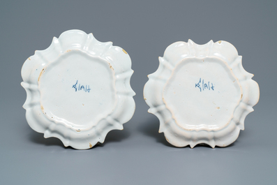 A pair of rare polychrome Dutch Delft honey pots, covers and stands, 18th C.