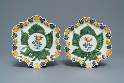 A pair of rare polychrome Dutch Delft honey pots, covers and stands, 18th C.